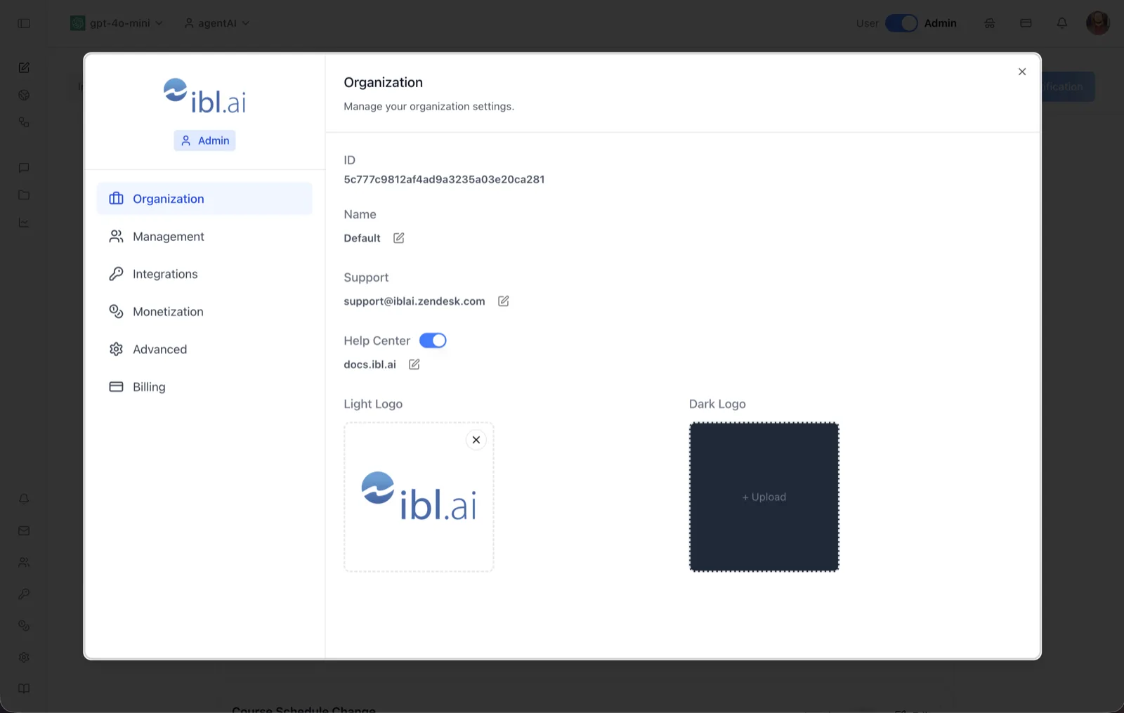 Organization settings page showing the organization ID, name, support email, Help Center toggle, and light and dark logo uploaders
