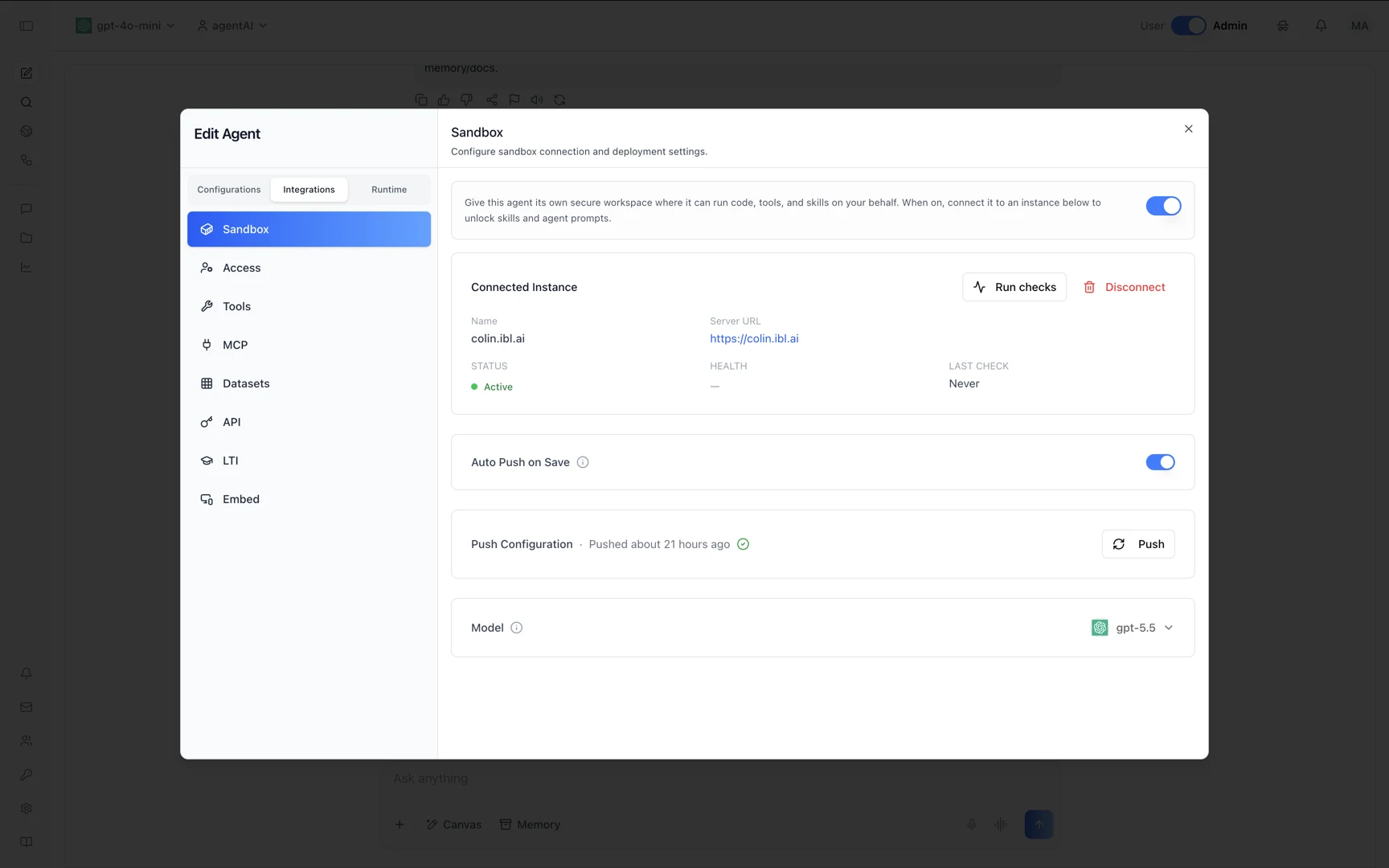 The Sandbox tab of the Edit Agent dialog: a connected instance named colin.ibl.ai with its server URL, an Active status, Auto Push on Save enabled, a Push Configuration row showing the last push, and the selected model.
